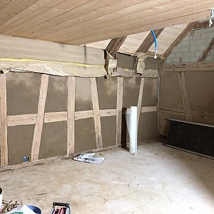 Lehmputz mit Wandfächenheizung